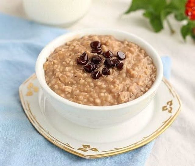 Hot Oatmeal Bowl Served with Milk.